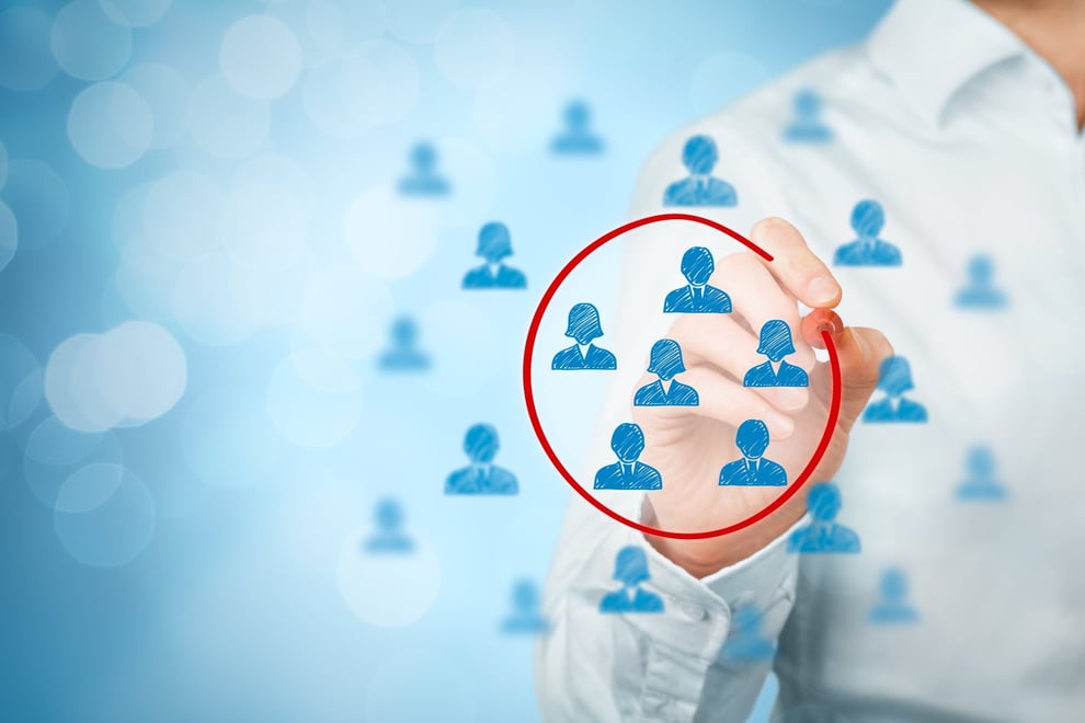 Defining buyer-personas - circling profiles with red pen